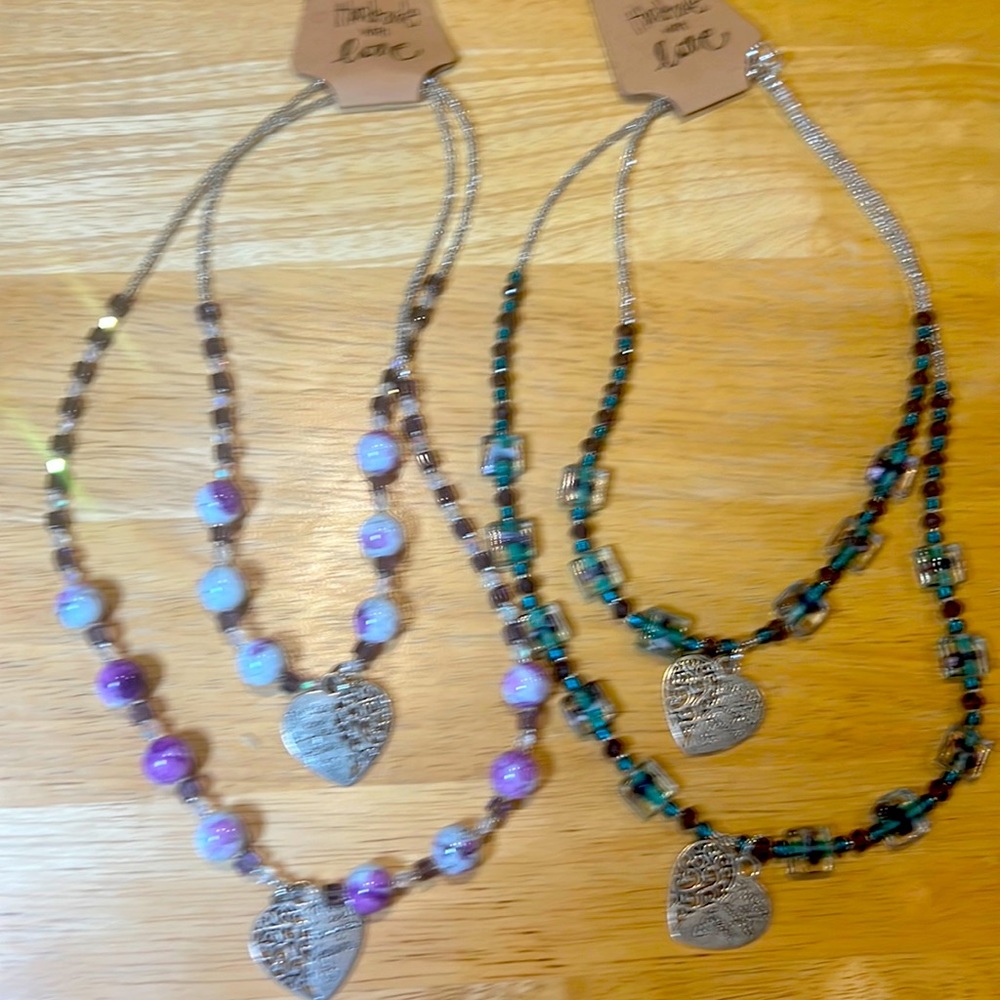 A pair of Mother/daughter necklace sets
